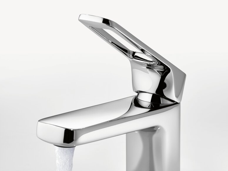 HEWI AQ single-lever washbasin mixer tap Stainless steel washbasin tap with a straight spout and side lever, shown with running water