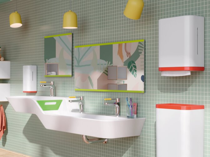 Double washbasin with taps and two rectangular mirrors on a section of wall tiled in green in the children’s bathroom