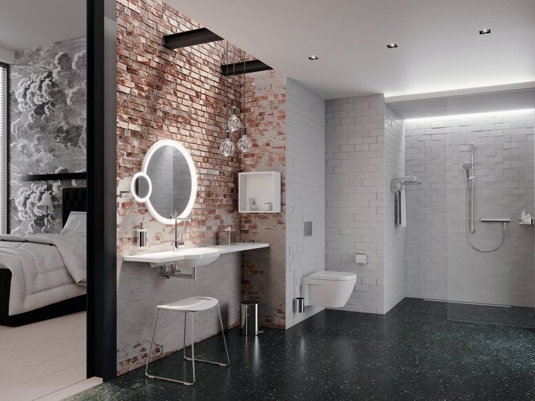 An accessible washbasin with a mirror and shelf, situated next to a wall-hung WC and a walk-in shower with a shower head holder