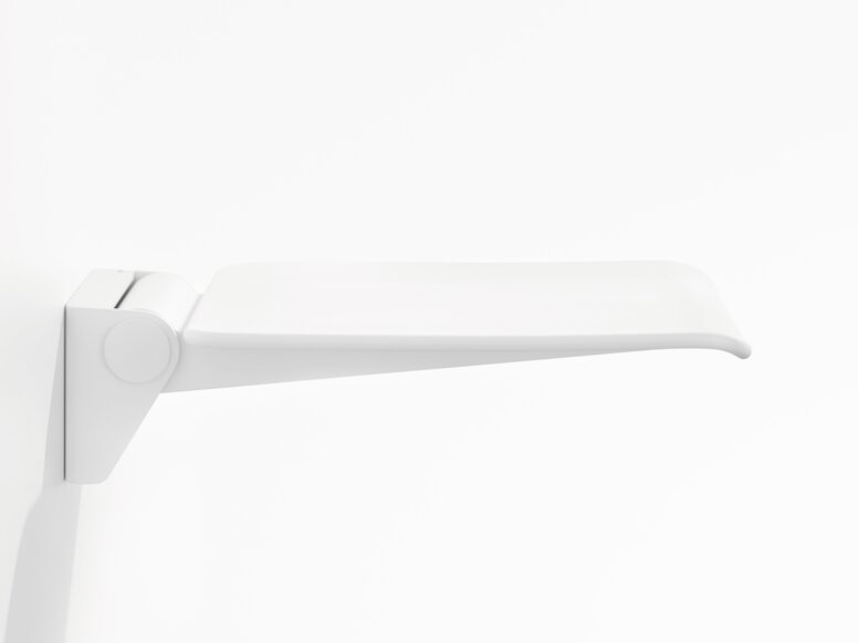 HEWI System 900 hinged seat White wall-mounted hinged seat with a flat seating surface and rounded front edge against a white background, viewed from the side