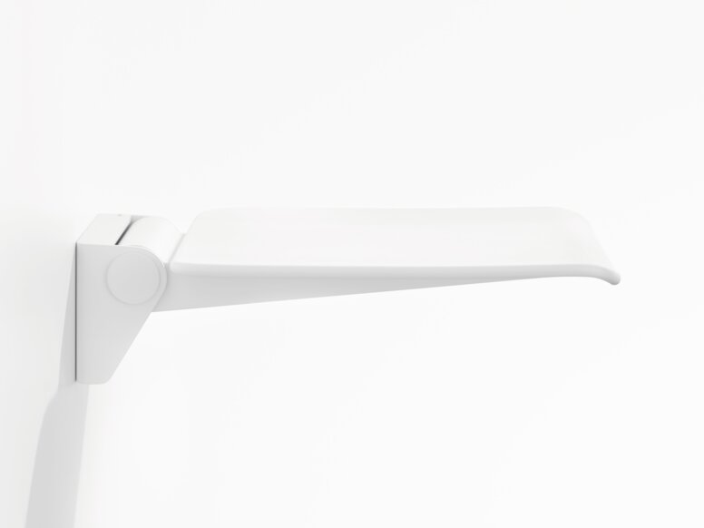 HEWI System 900 hinged seat White wall-mounted hinged seat with a flat seating surface and rounded front edge against a white background, viewed from the side